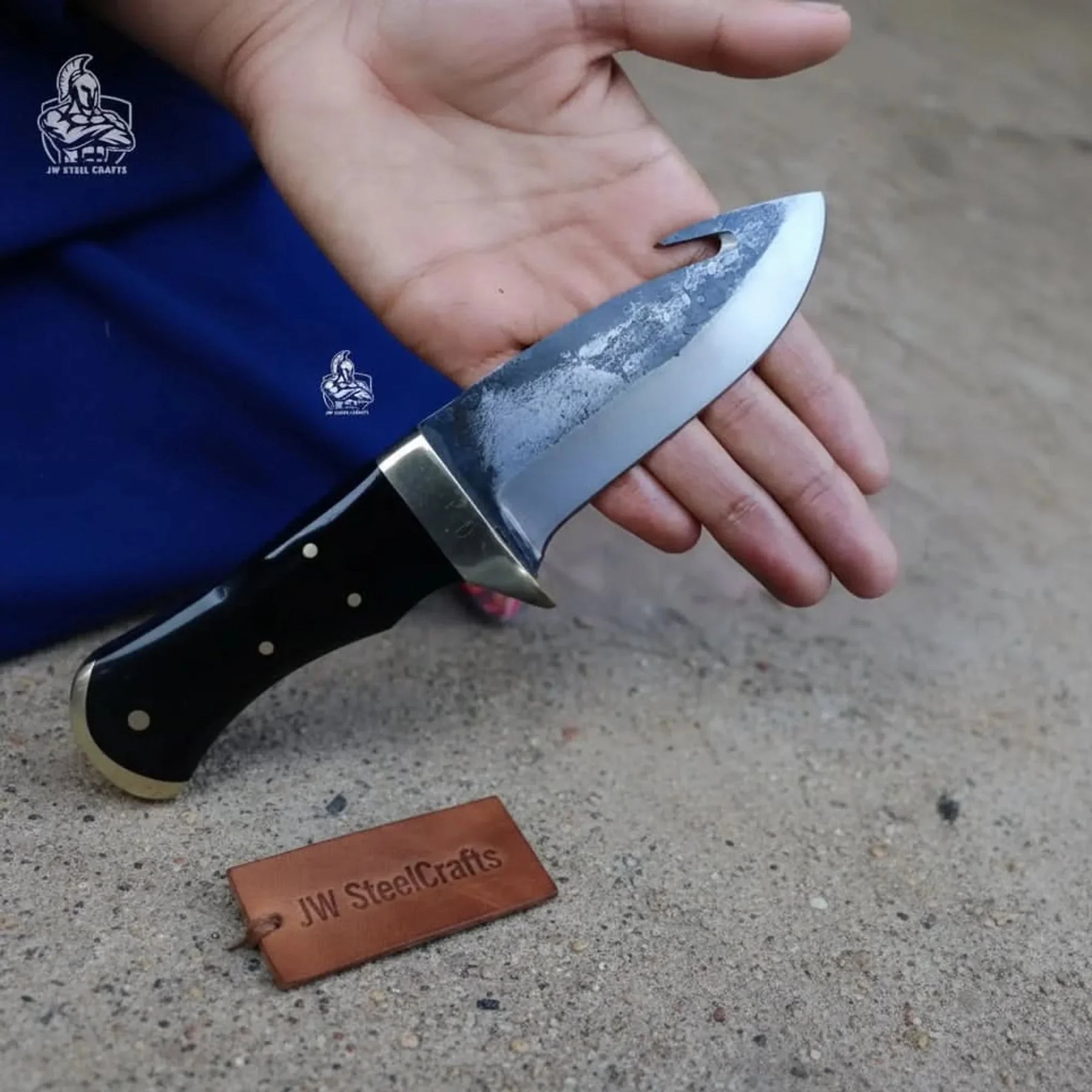 Gut hook knife with wood and brass handle detail view by JW SteelCrafts