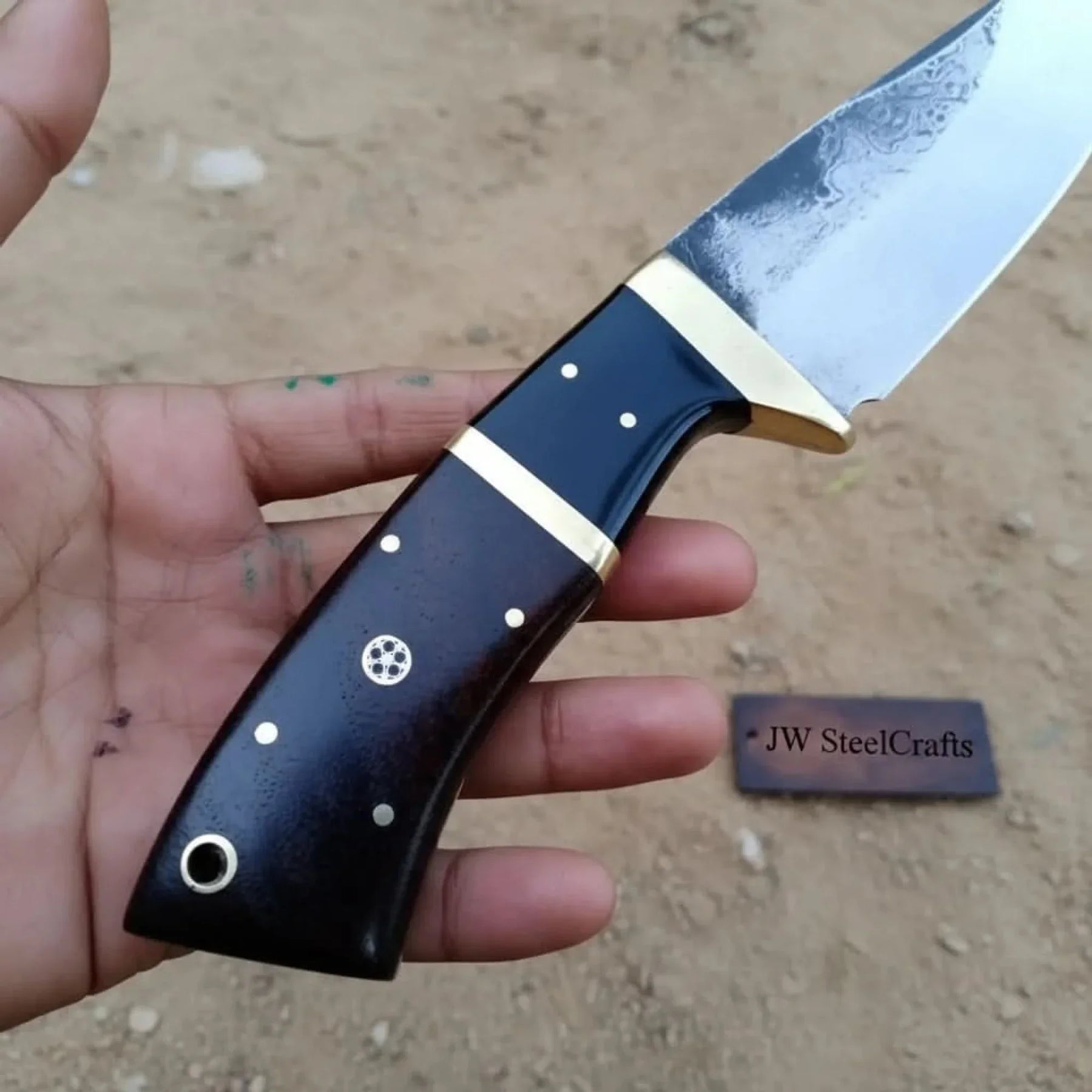 Gut hook knife with wood and brass handle detail view by JW SteelCrafts