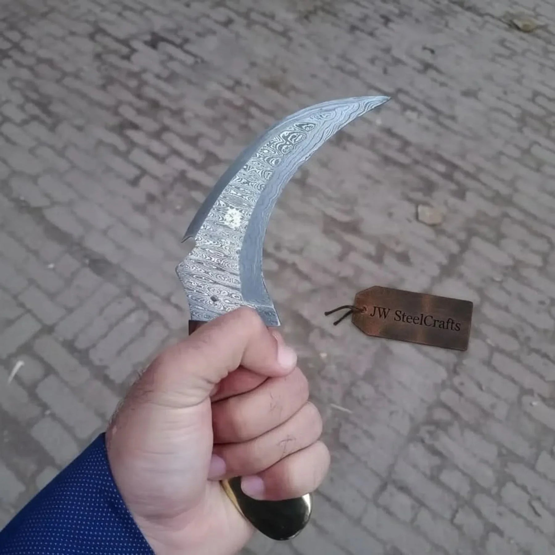 Damascus karambit knife.. detail view by JW SteelCrafts