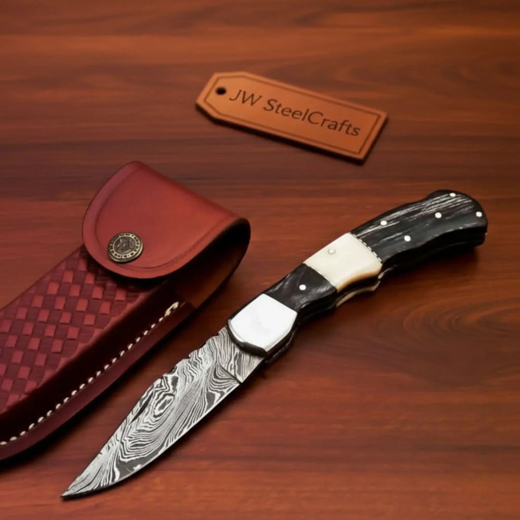 Handmade Damascus Folding Pocket Knife Engraved & Plain Handle Variants | Leather Sheath Included detail view by JW