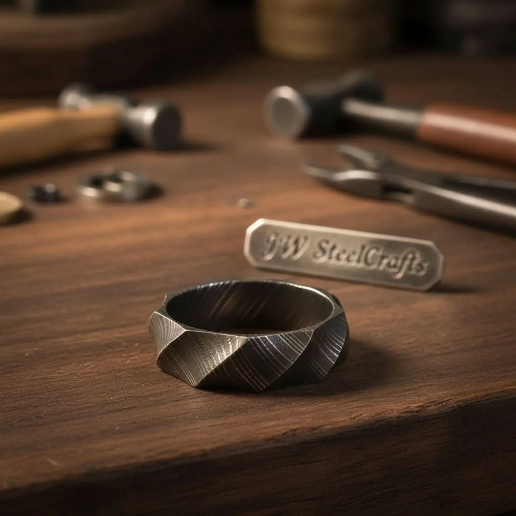 Mens Damascus Steel Faceted Wedding Band Handmade Geometric Ring detail view by JW SteelCrafts