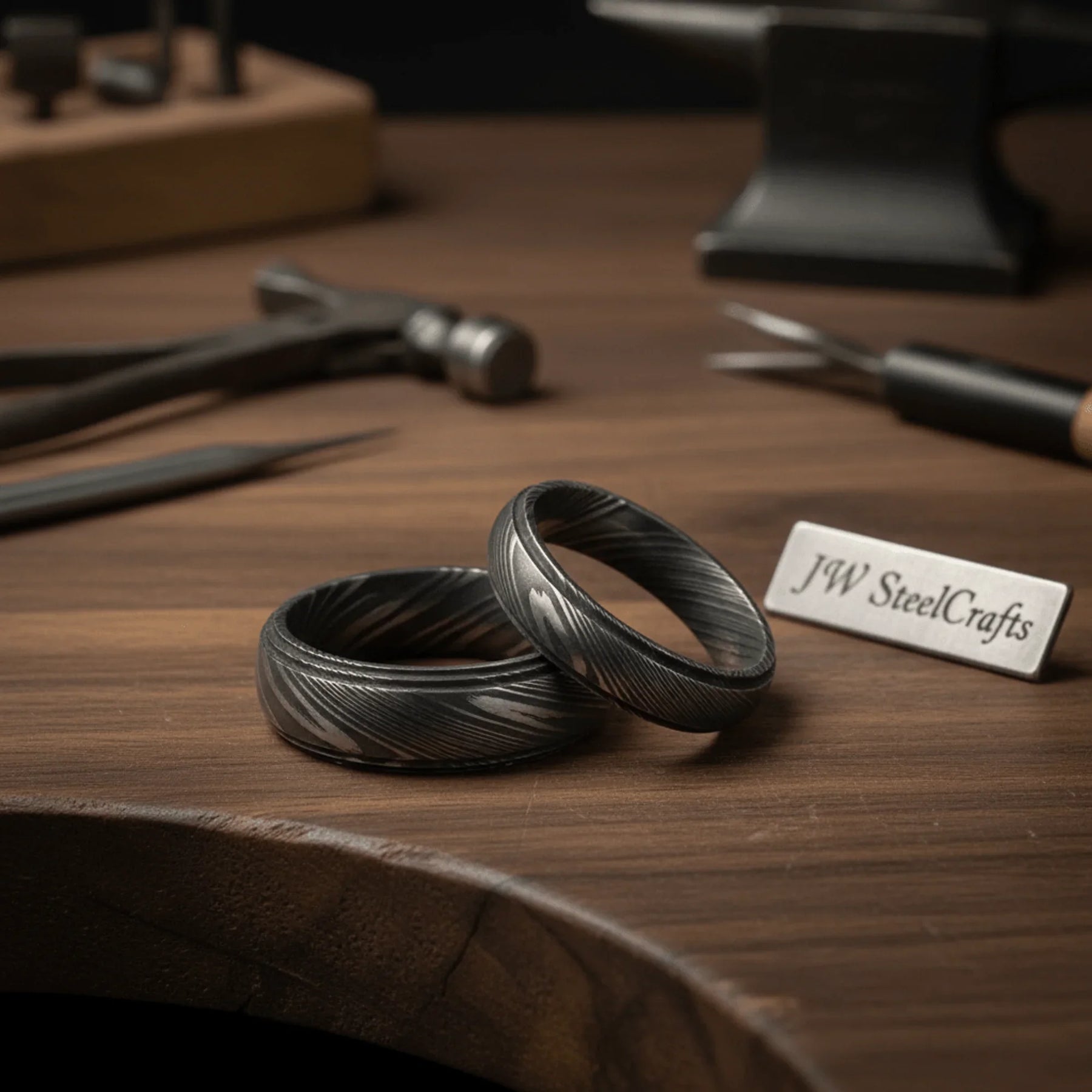Damascus Steel Wedding Band Set with Wide and Slim Black Rings by JW SteelCrafts