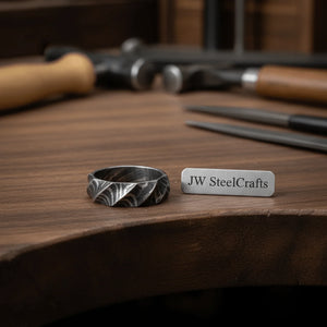 Geometric Damascus Faceted Ring with Twisted Multi-Facet Design detail view by JW SteelCrafts