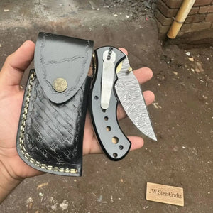 Damascus Steel Folding Pocket Knife — Recurve Clip Point Blade, Black Resin Handle, Pocket Clip & Cowhide Leather Sheath by JW SteelCrafts, leather knife sheath detail photo 3