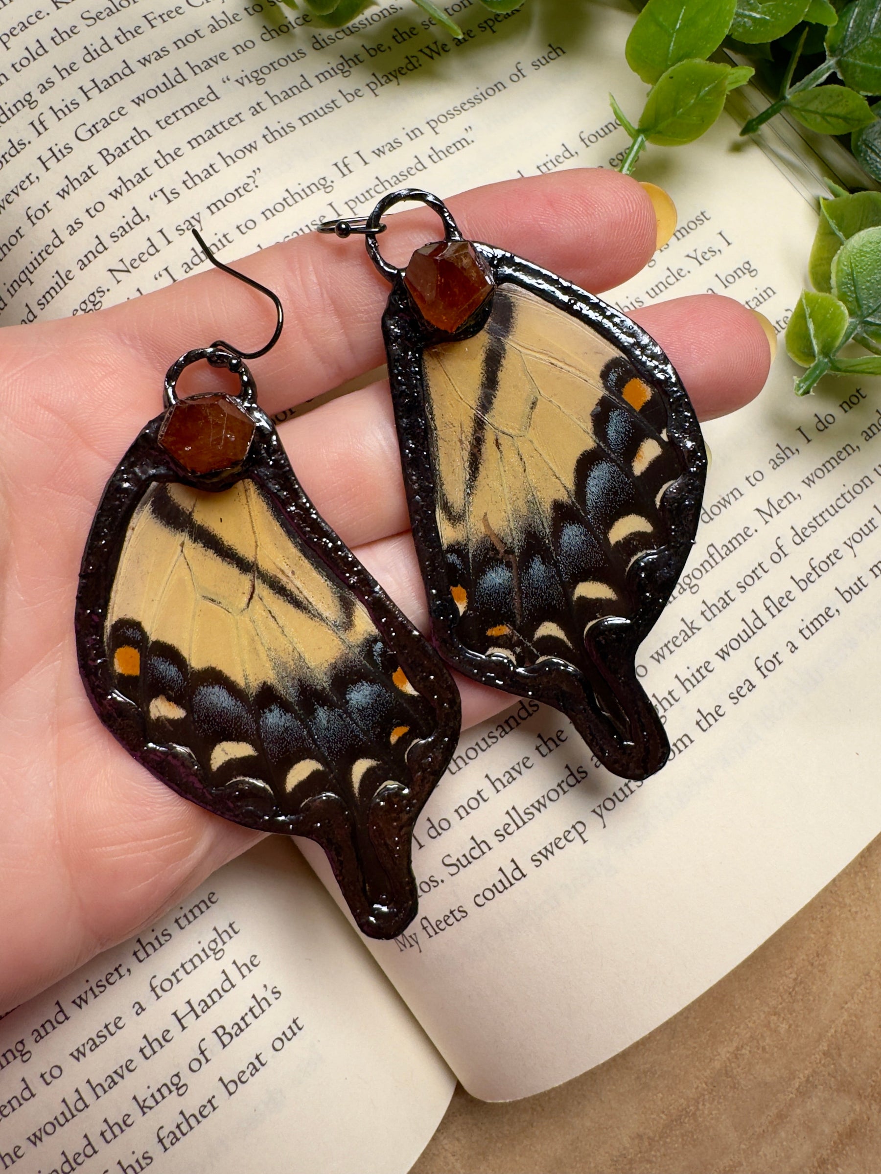 Butterfly Wing and Orange Garnet Earrings detail view by Copper Ashes