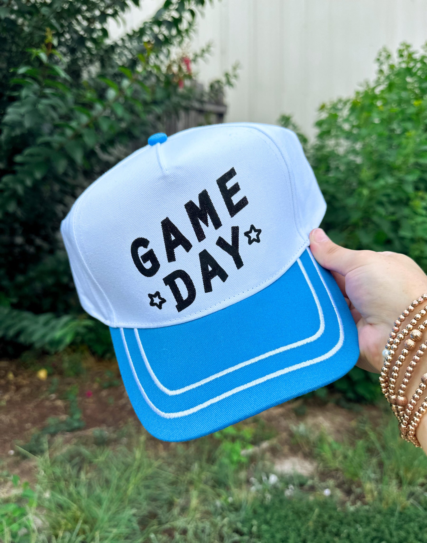 Game Day White/Blue Canvas Trucker Hat detail view by Southern Bliss Company
