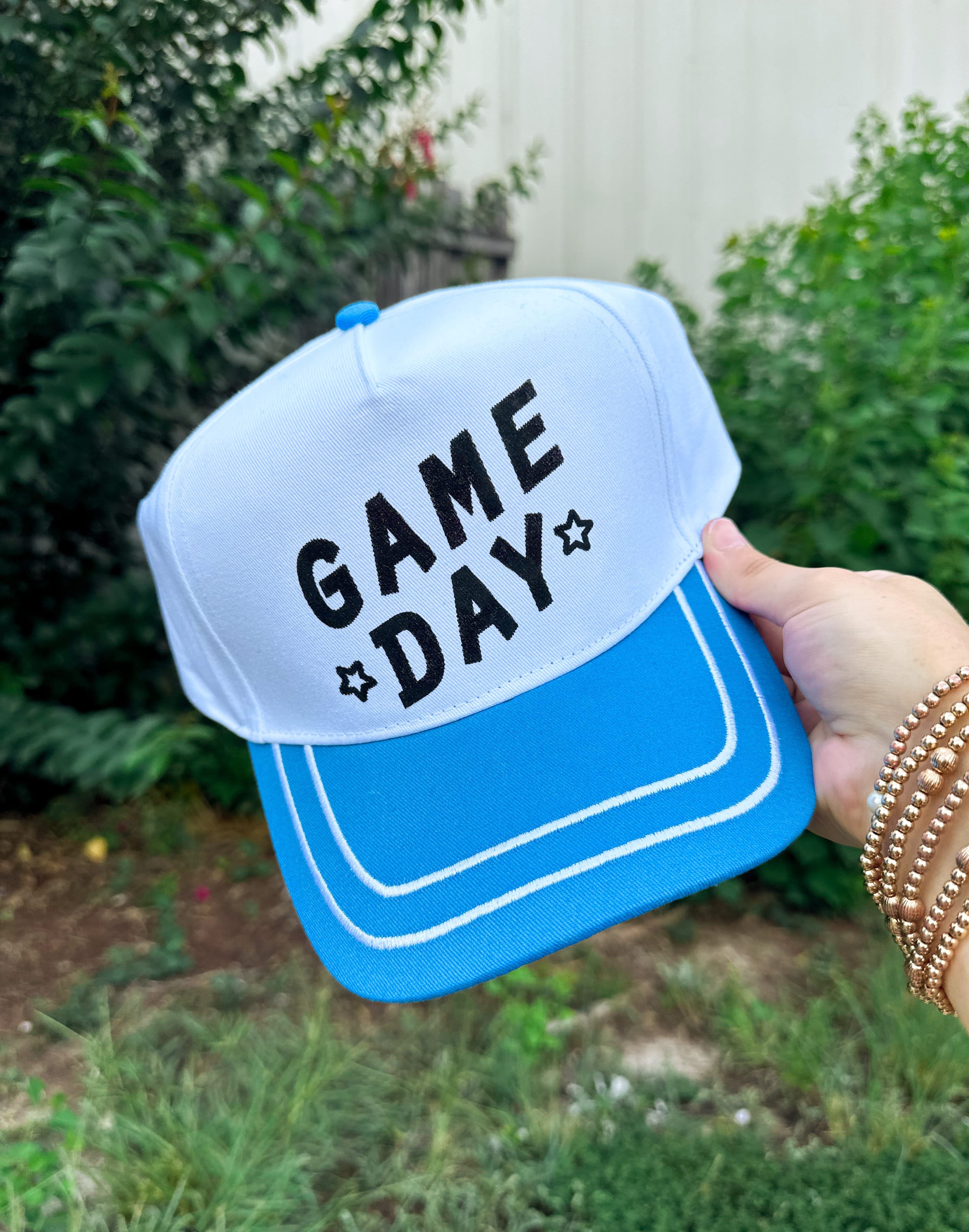 Game Day White/Blue Canvas Trucker Hat detail view by Southern Bliss Company