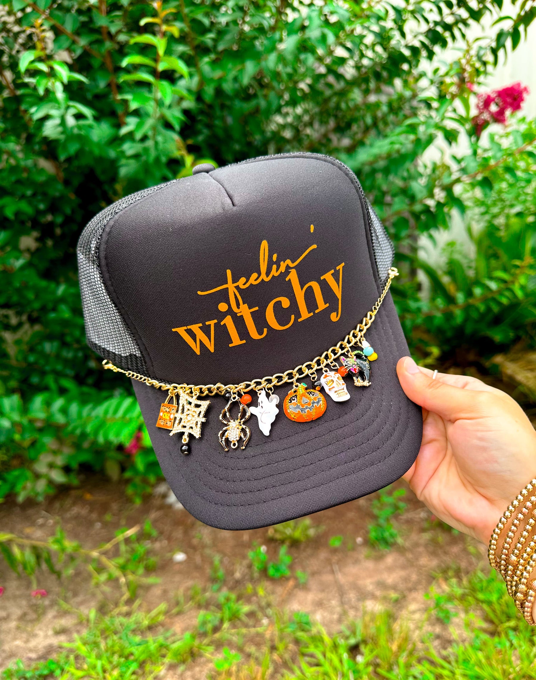 Feelin' Witchy (orange font) Black Trucker by Southern Bliss Company