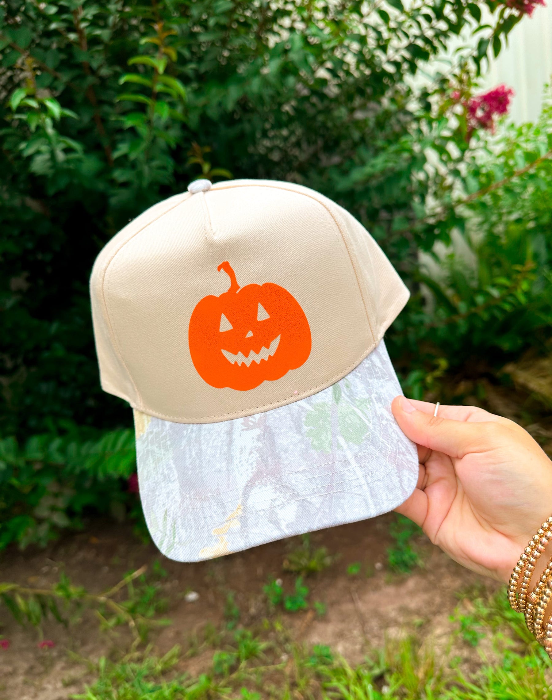 Halloween Pumpkin Khaki/Washed Camo Trucker Hat detail view by Southern Bliss Company