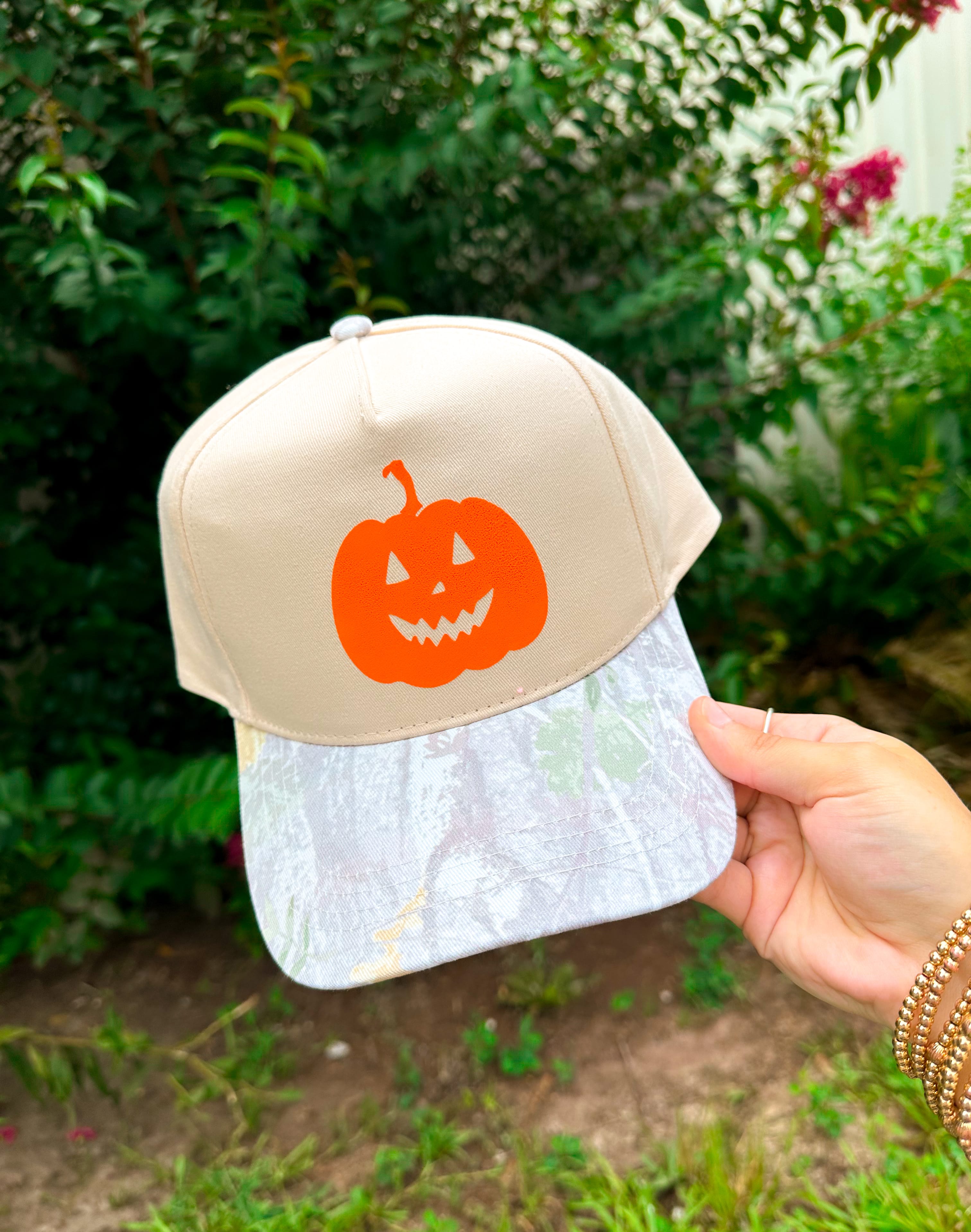 Halloween Pumpkin Khaki/Washed Camo Trucker Hat detail view by Southern Bliss Company