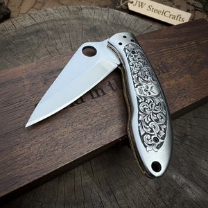 Hand Engraved D2 Steel Folding Pocket Knife — Mirror Polished Leaf Blade, Skull Floral Scroll Stainless Handle by JW SteelCrafts, Damascus knife detail photo 4