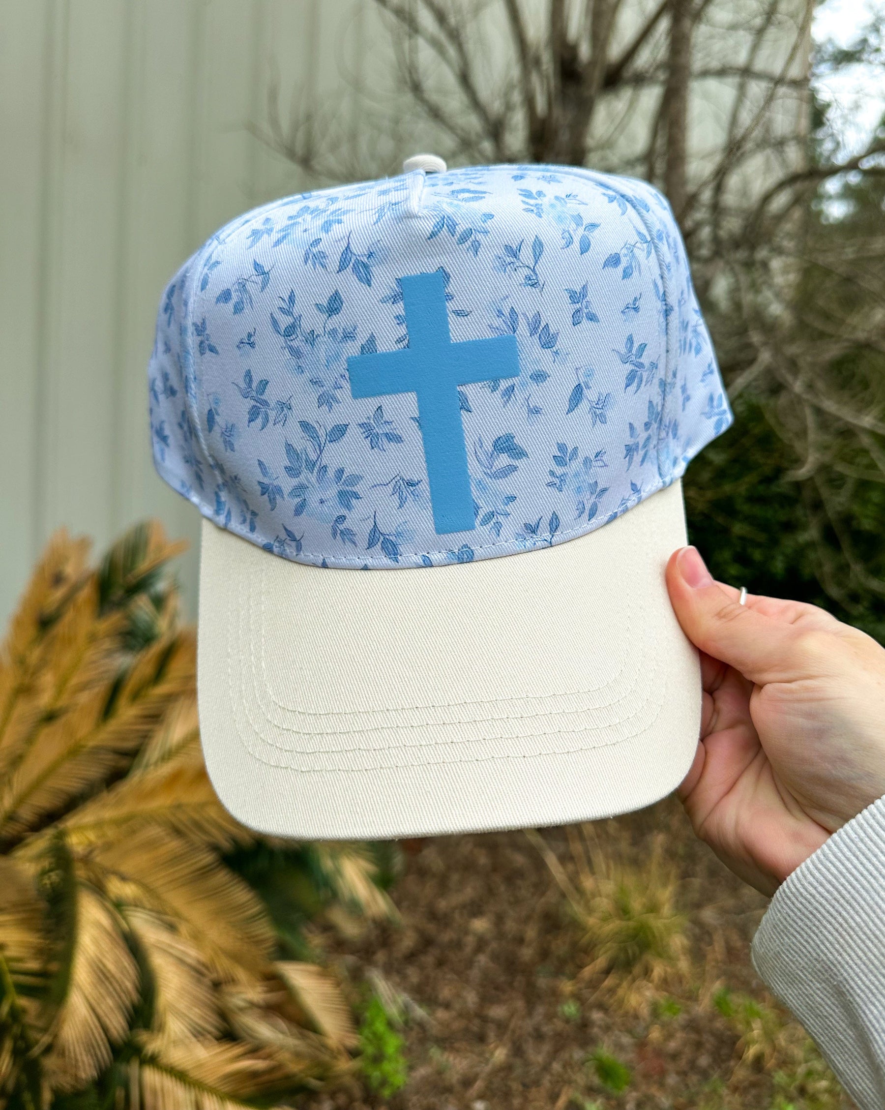 Cross Floral White/Light Blue Trucker Hat by Southern Bliss Company, Southern lifestyle apparel main product photo