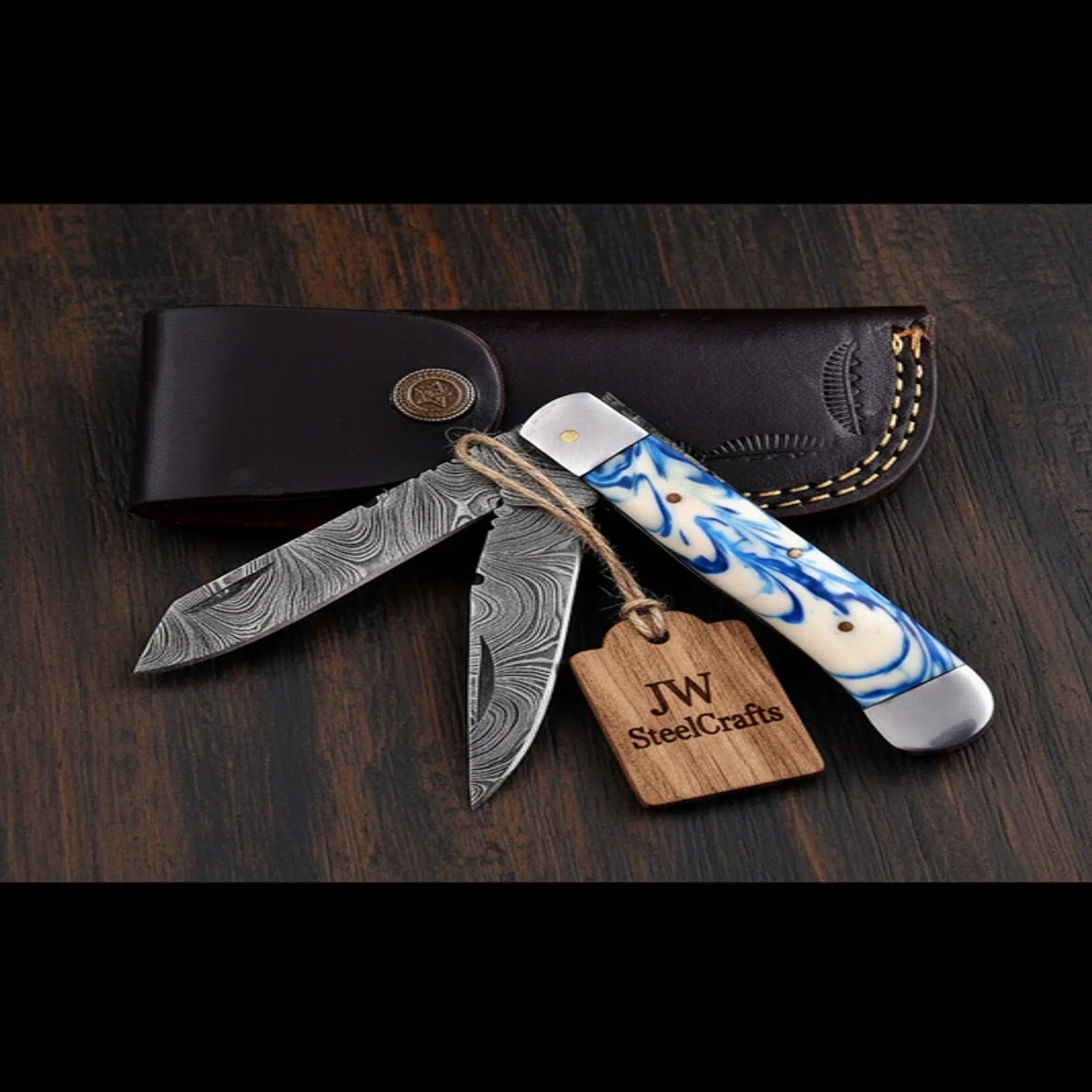 Dual-Blade Folding Trapper Sky Blue Resin Handle Steel Bolster Trapper