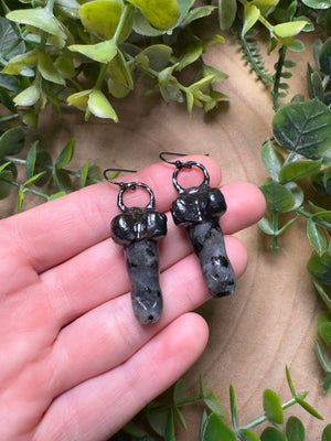 Larvikite Penis Earrings detail view by Copper Ashes