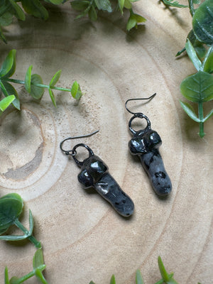 Larvikite Penis Earrings detail view by Copper Ashes