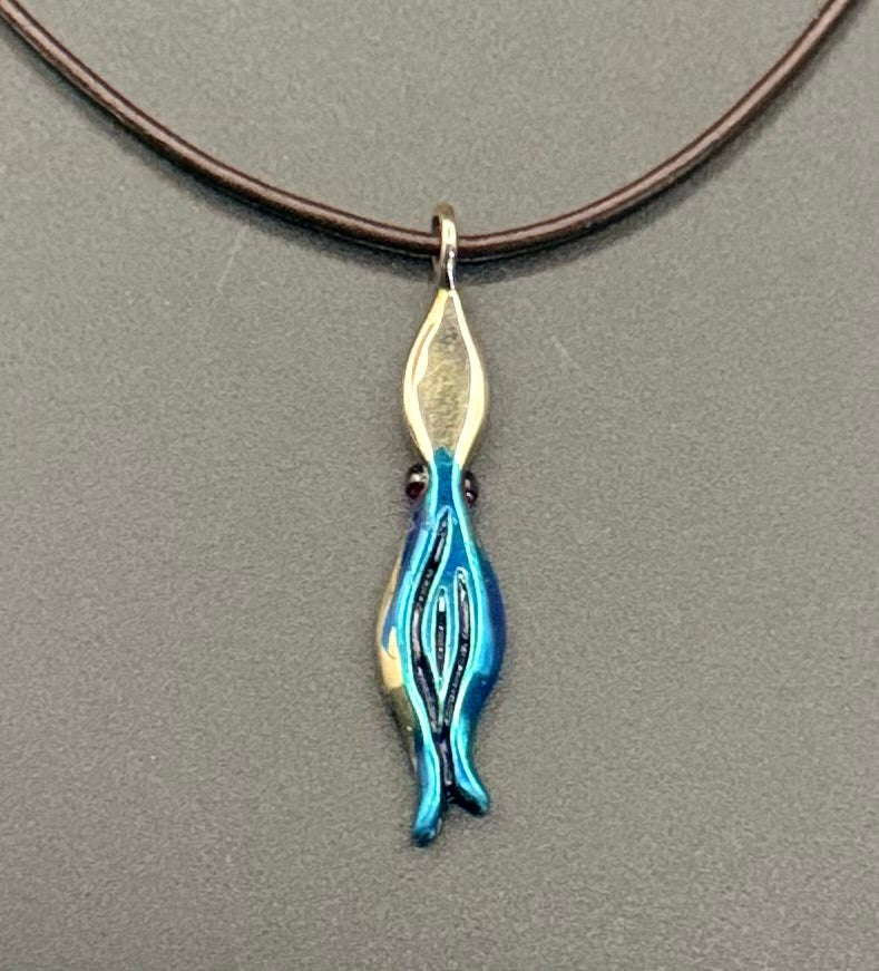 Small Bronze Squid Pendant with Garnet Eyes by Anisa Jewelry