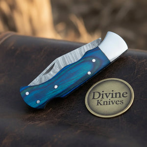 Blue Pakka Wood Handle Damascus Trapper Knife for Everyday Carry detail view by Divine Knives