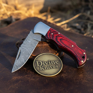 Red and Black Pakka Wood Damascus Folding Knife for Outdoor Use detail view by Divine Knives