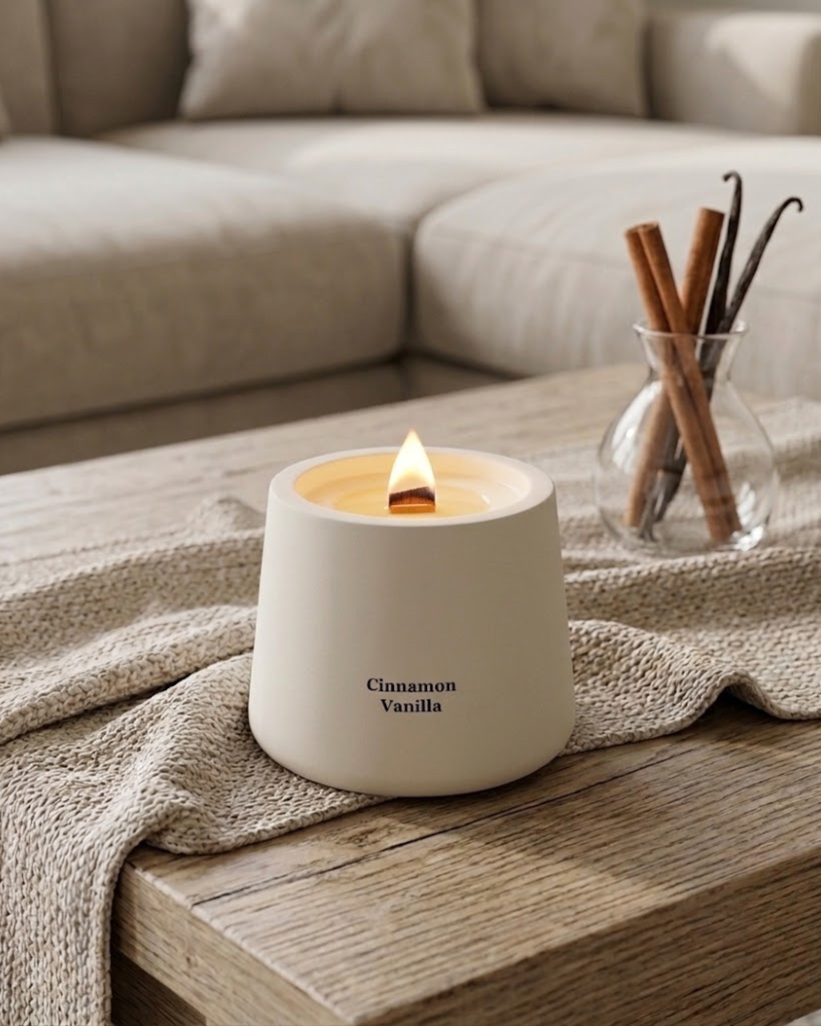 Cinnamon vanilla candle in a handmade white ceramic jar by Believe Candle