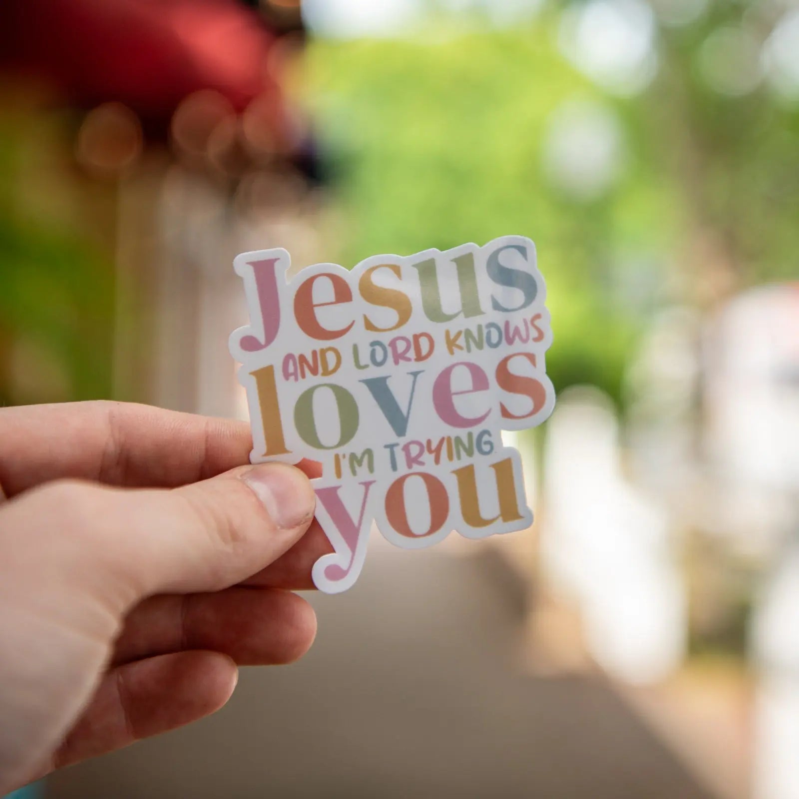 Jesus love you, and lord knows i am trying- Sticker by Still Magnolia, vinyl decal main product photo