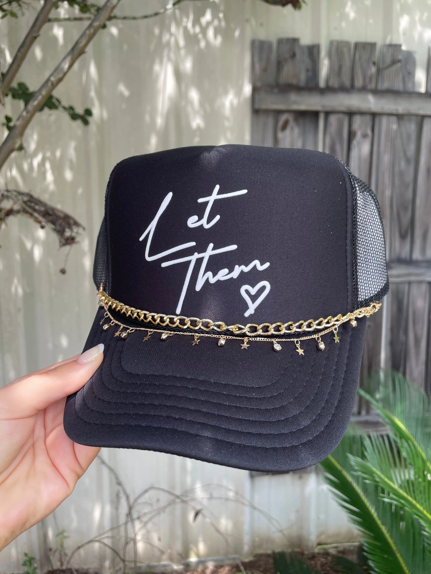 Let Them Black Trucker Hat by Southern Bliss Company, Southern lifestyle apparel main product photo