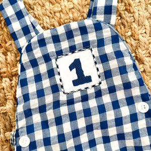 Navy Blue Smocked First Birthday Sunsuit by Seven Lantern Lane, children's boutique clothing detail photo 8