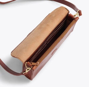 Nisolo Cleo Leather Convertible Crossbody Clutch by Mission Mercantile Leather Goods, natural skincare detail photo 10