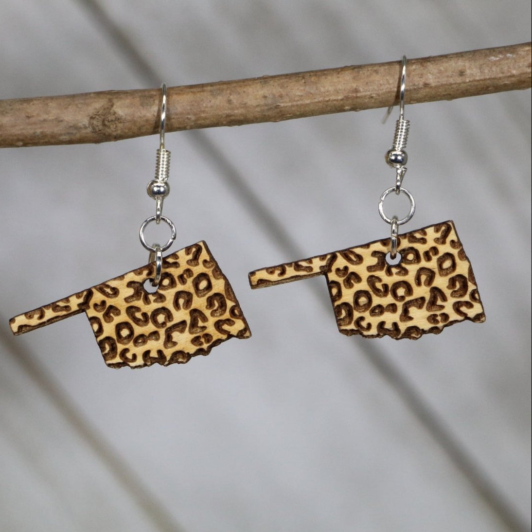 Oklahoma State Cheetah Print Wooden Earrings | State Pride Jewelry detail view by Cate's Concepts, LLC
