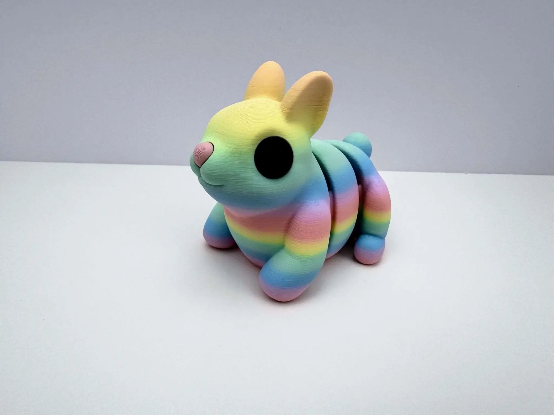 Pastel Rainbow Bunny 3D Printed Fidget Toy | Large Sensory Toy by Mushroom Lady Co, paper gift detail photo 2