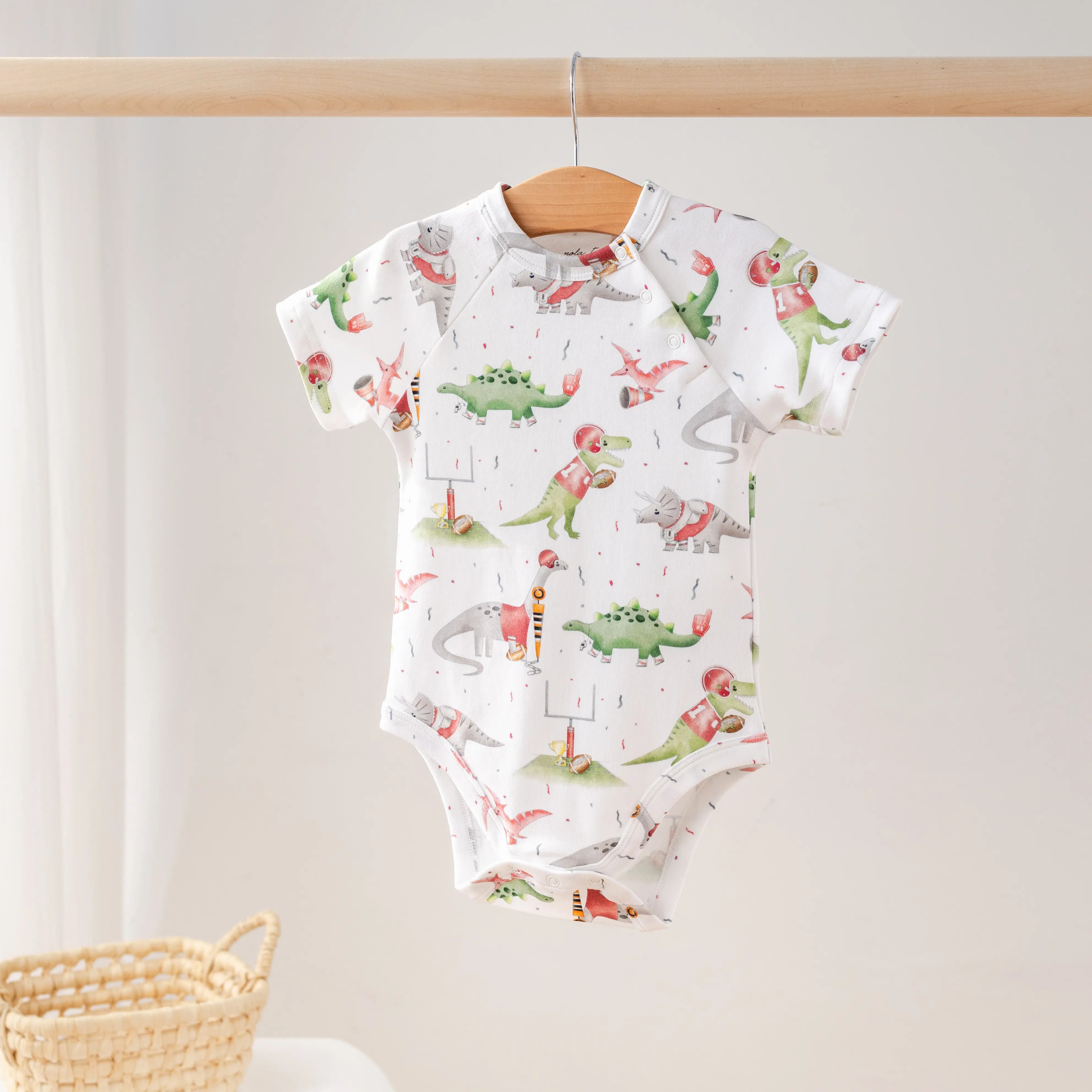 Red Dino All-Stars Organic Cotton Onesie by Nola Tawk, Southern lifestyle apparel main product photo