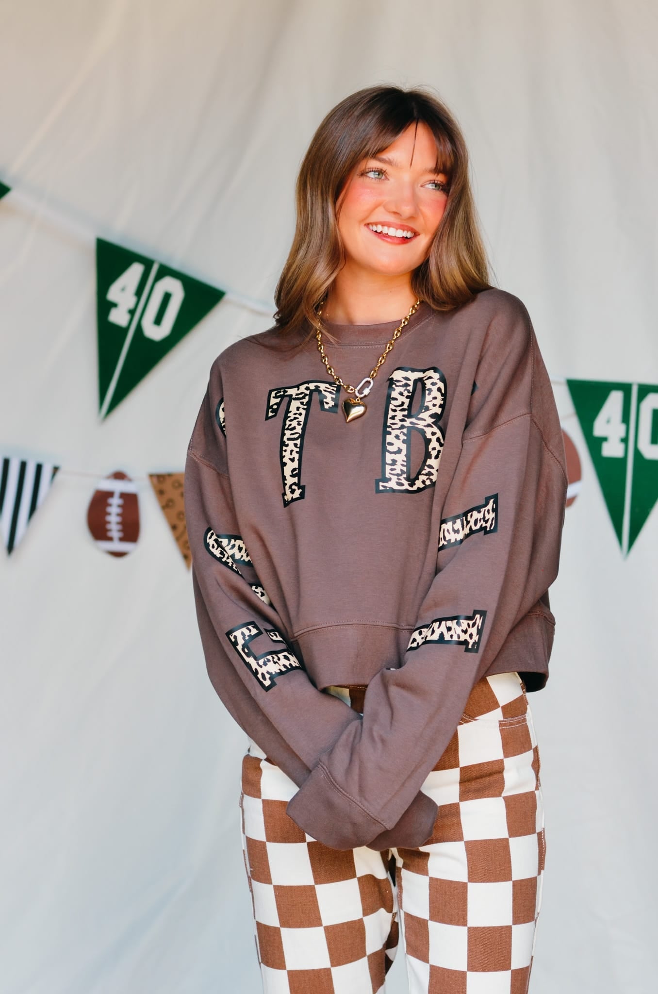 Football Leopard Mocha Crop Sweatshirt detail view by Southern Bliss Company