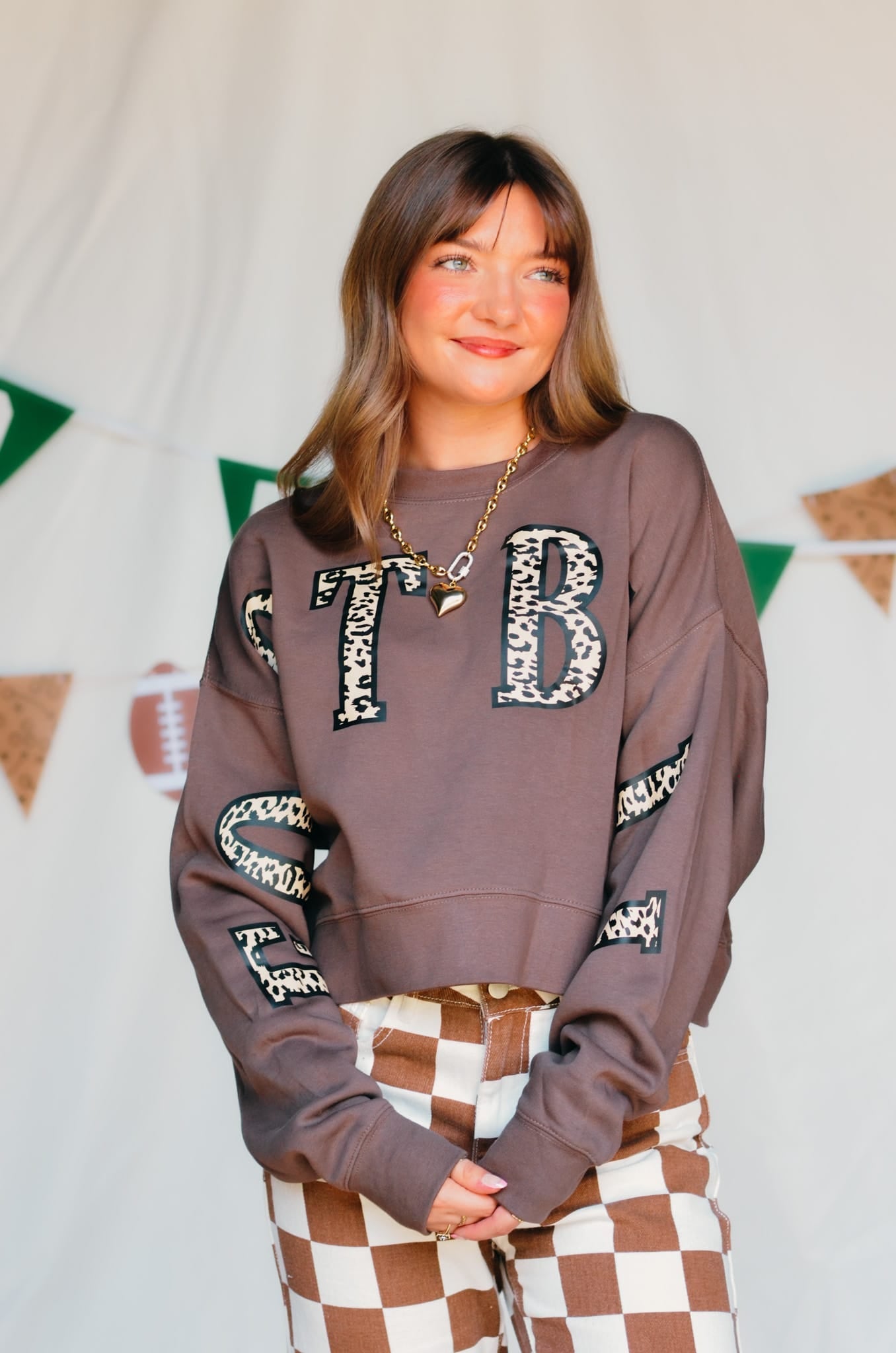 Football Leopard Mocha Crop Sweatshirt detail view by Southern Bliss Company