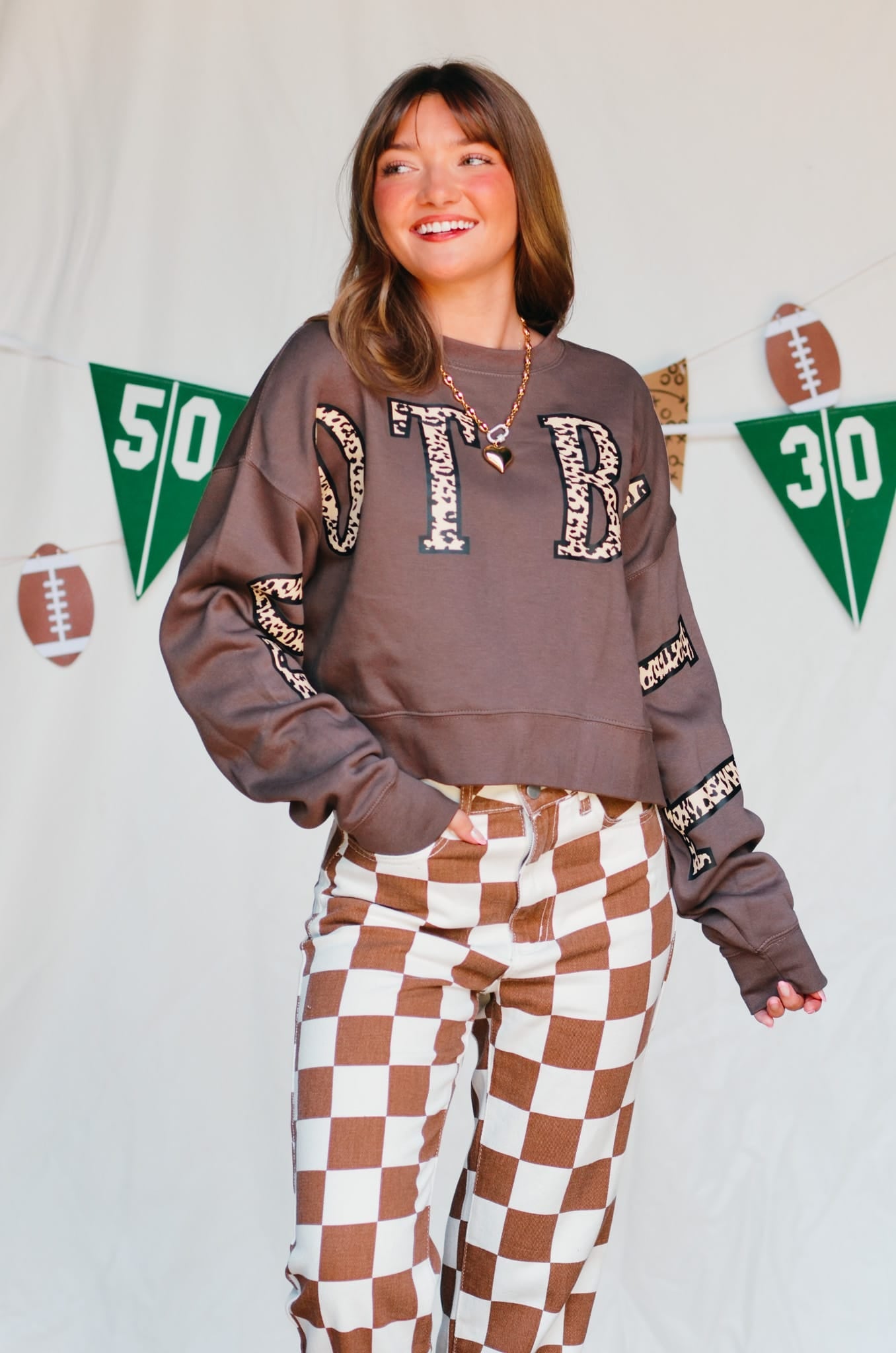 Football Leopard Mocha Crop Sweatshirt detail view by Southern Bliss Company
