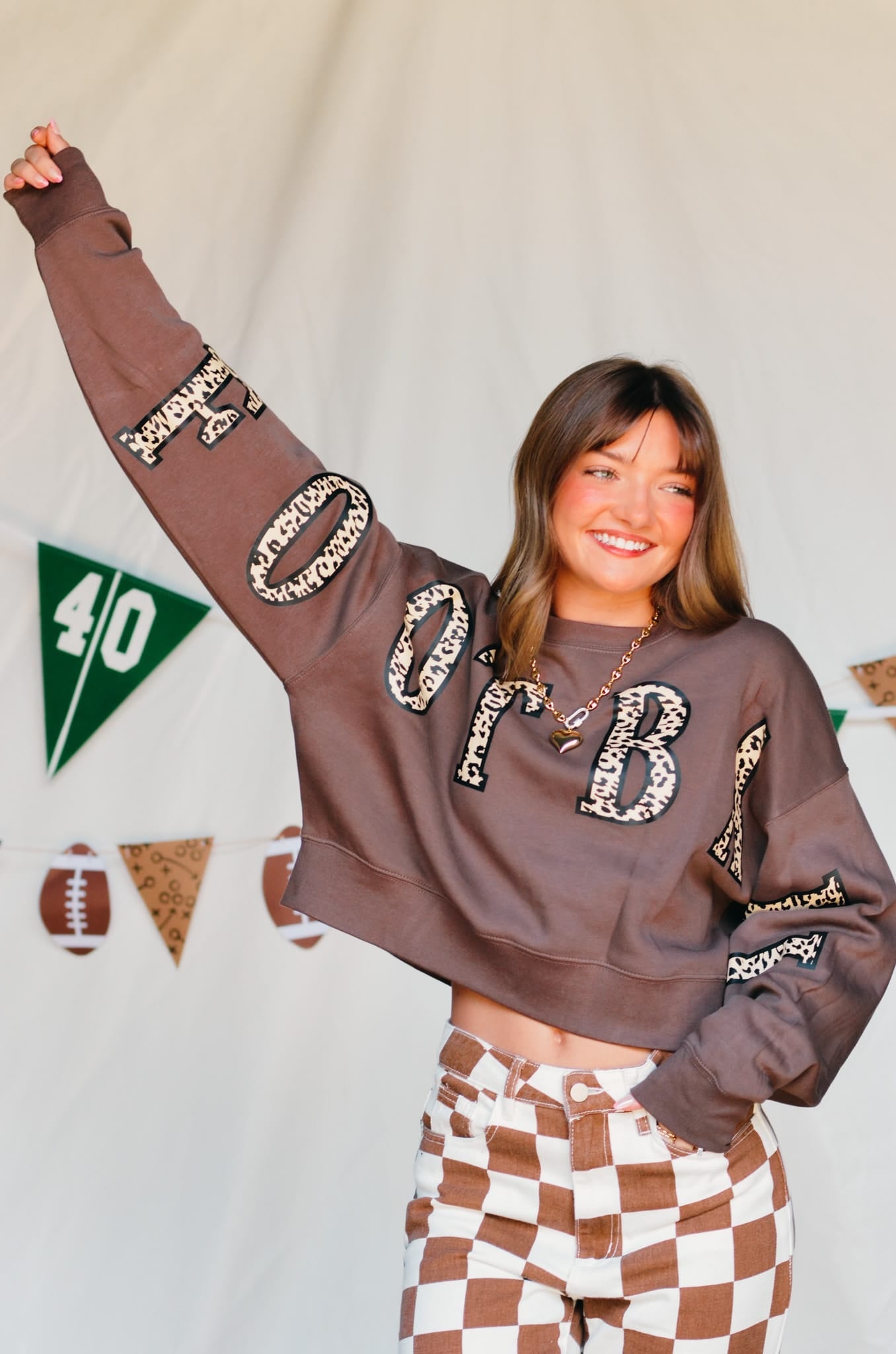 Football Leopard Mocha Crop Sweatshirt detail view by Southern Bliss Company