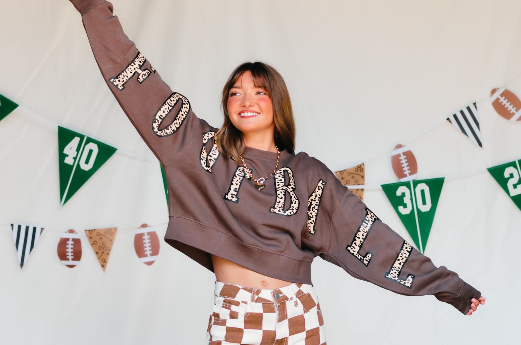 Football Leopard Mocha Crop Sweatshirt detail view by Southern Bliss Company