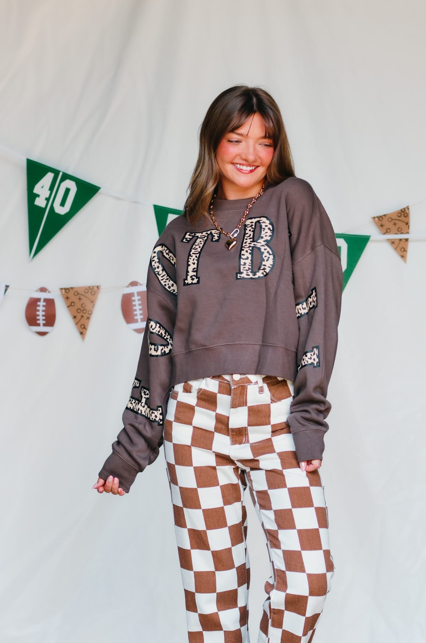 Football Leopard Mocha Crop Sweatshirt detail view by Southern Bliss Company
