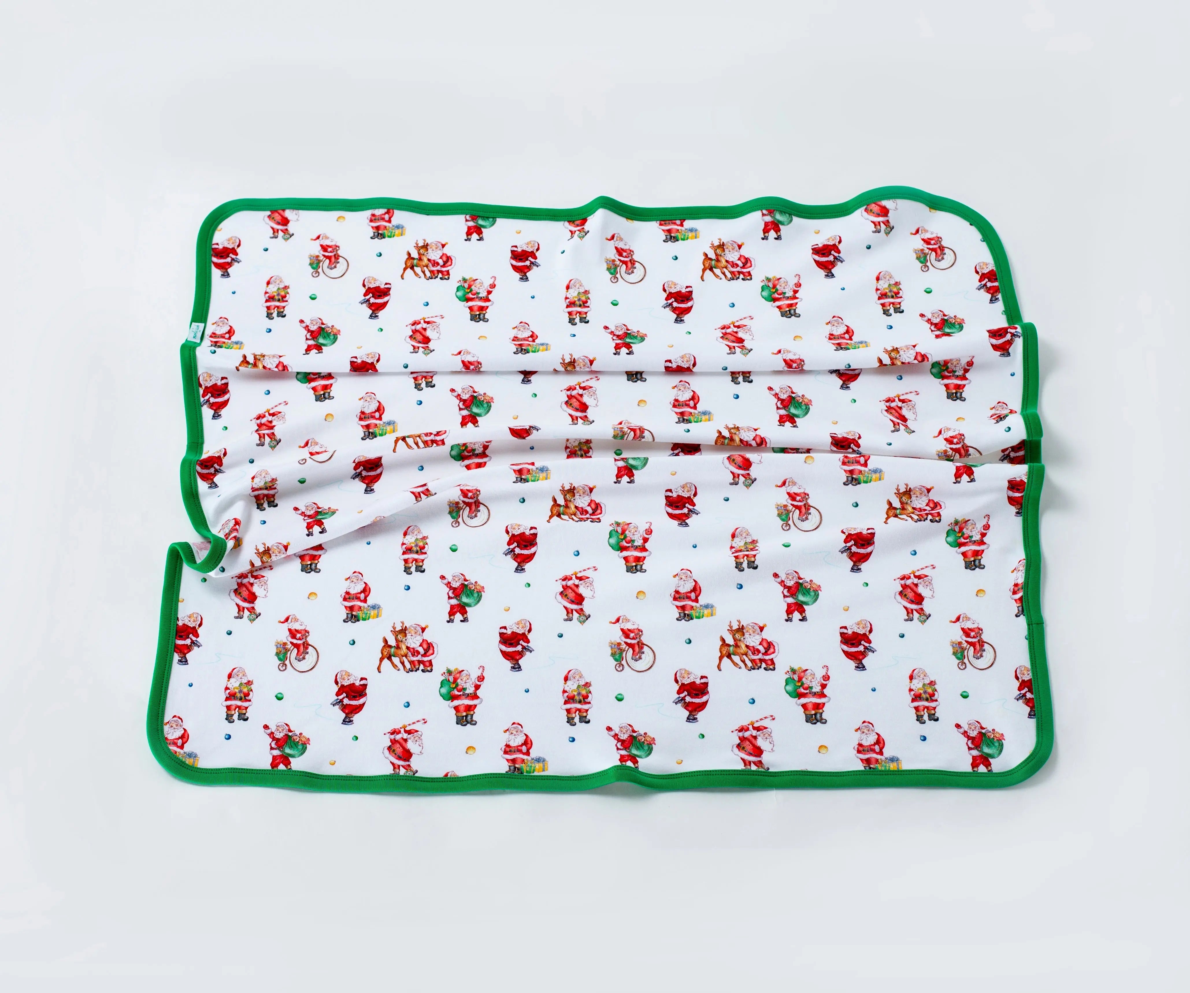 Santa Claus is Coming to Town Organic Cotton Christmas Baby Blanket by Nola Tawk, children's boutique clothing main product photo