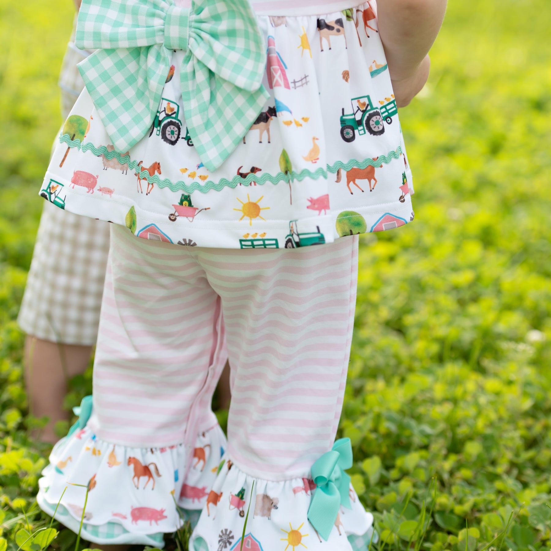 Girls Tractor Romper detail view by Seven Lantern Lane