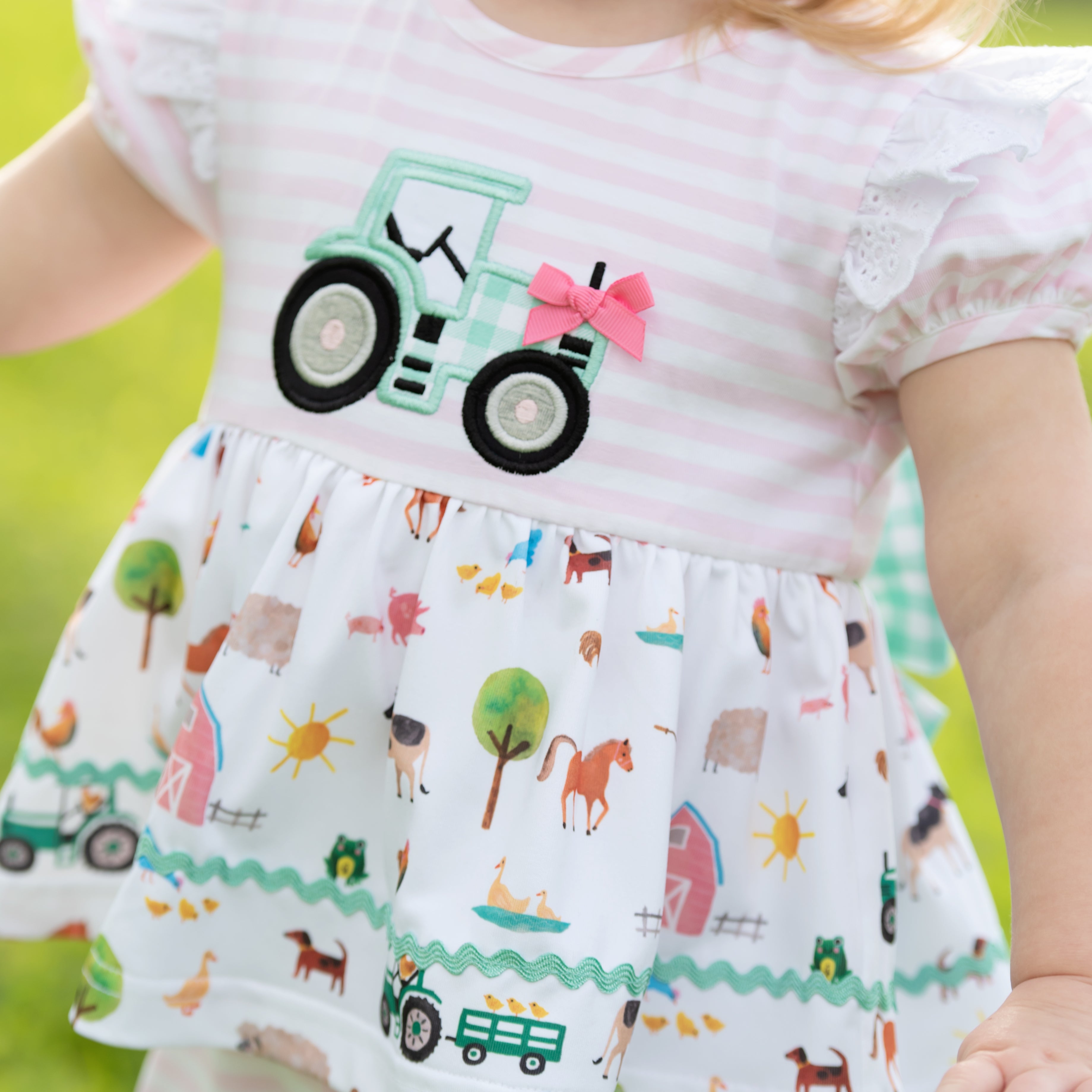 Girls Tractor Romper detail view by Seven Lantern Lane