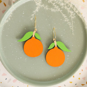Additional view of Tangerine Hoop Earrings hand painted on lightweight wood by LE CHIC MIAMI