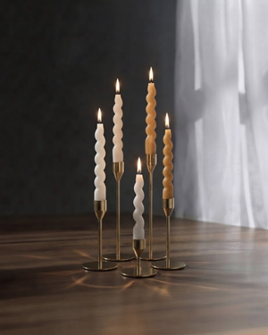Set of two swirl sculptural taper candles by Believe Candle