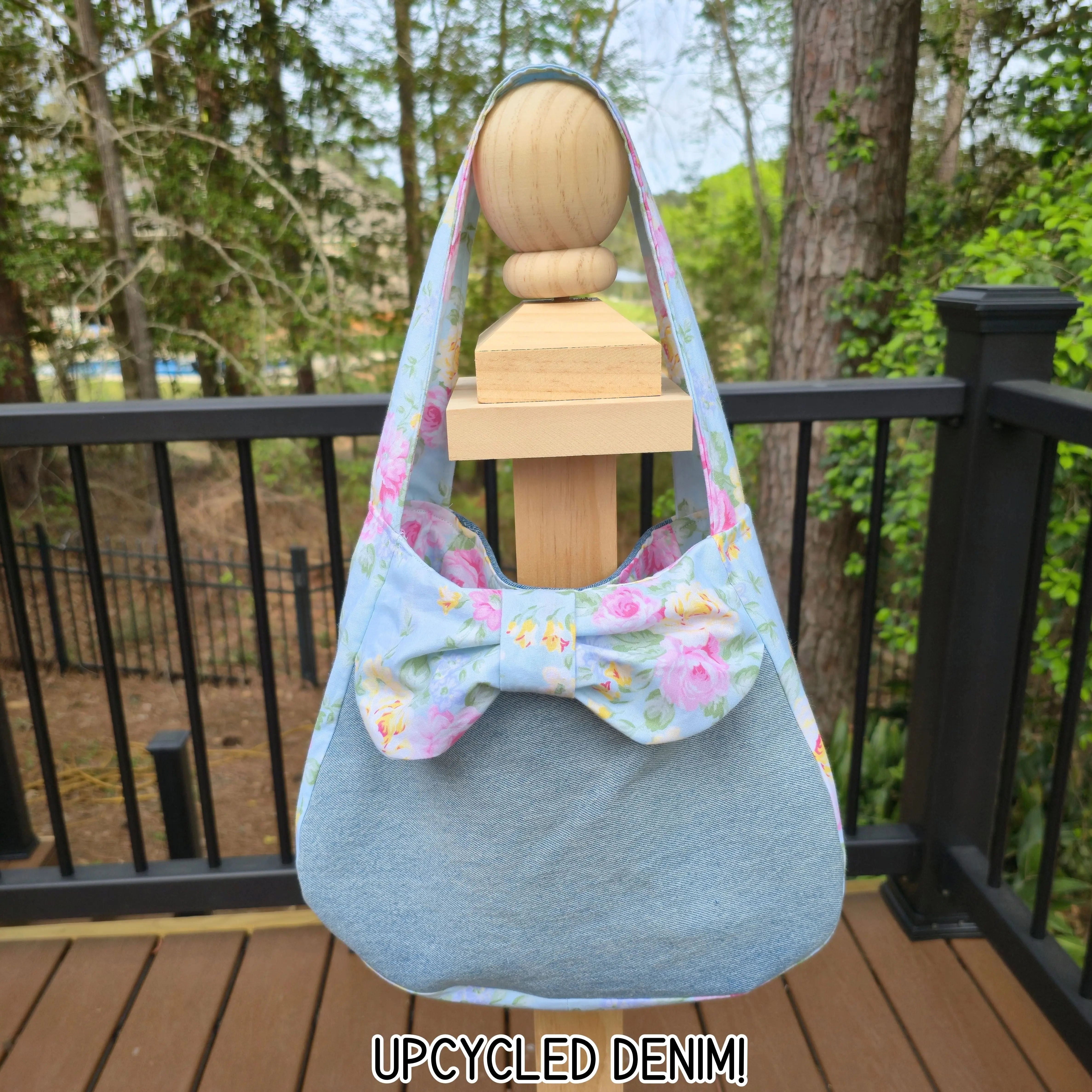 Upcycled Denim Shoulder Bag with Floral Bow, Handmade Denim Purse, Small Hobo Bag by Maypop House Designs, handmade leather goods main product photo