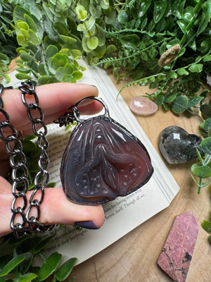 Agate Yoni Carving Necklace by Copper Ashes