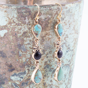 Barcelona Blue Turquoise and Black Onyx Linear Drop Golden Earrings detail view by Barse Jewelry