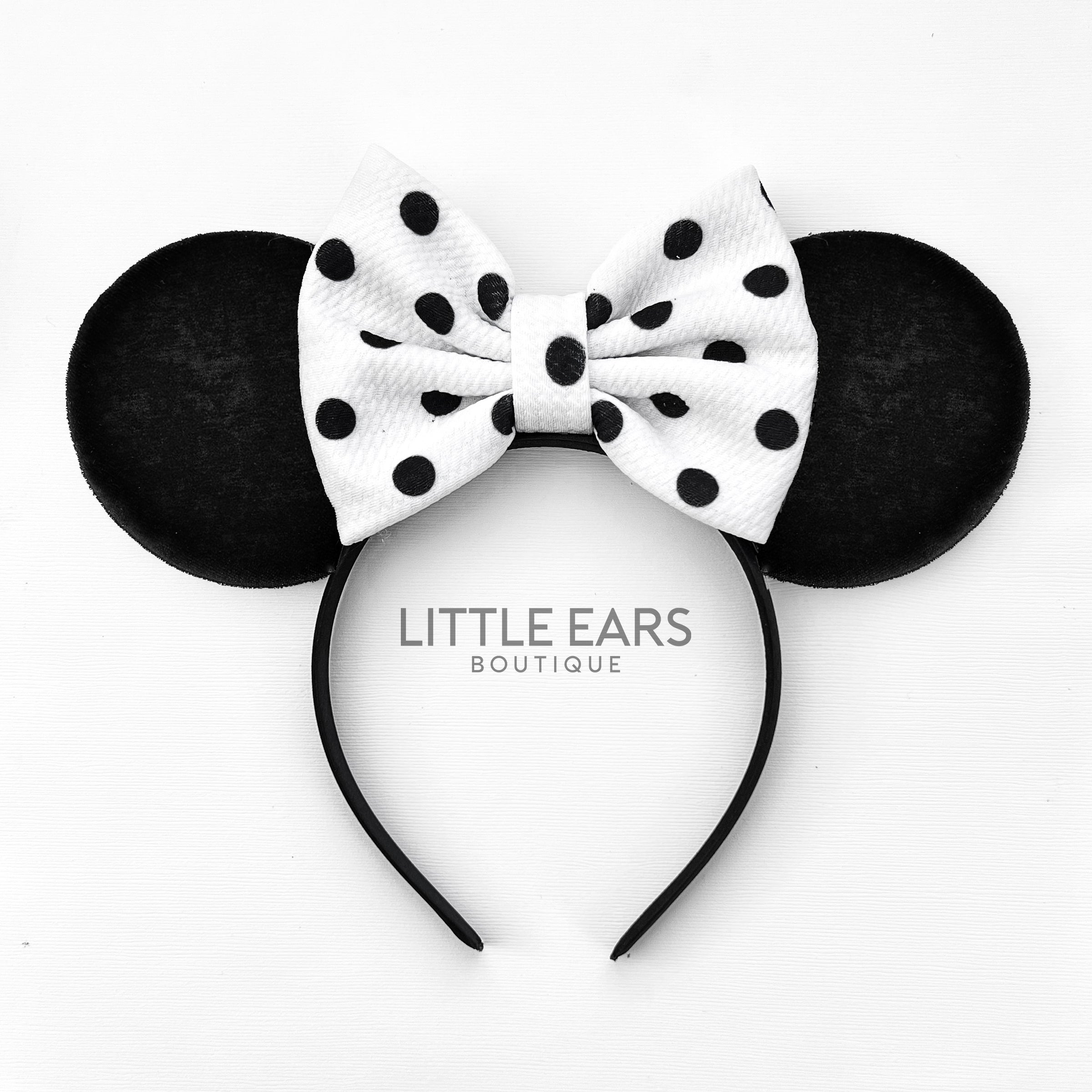 Black Dotted Bow Ears by Little Ears Boutique, travel planning service main product photo