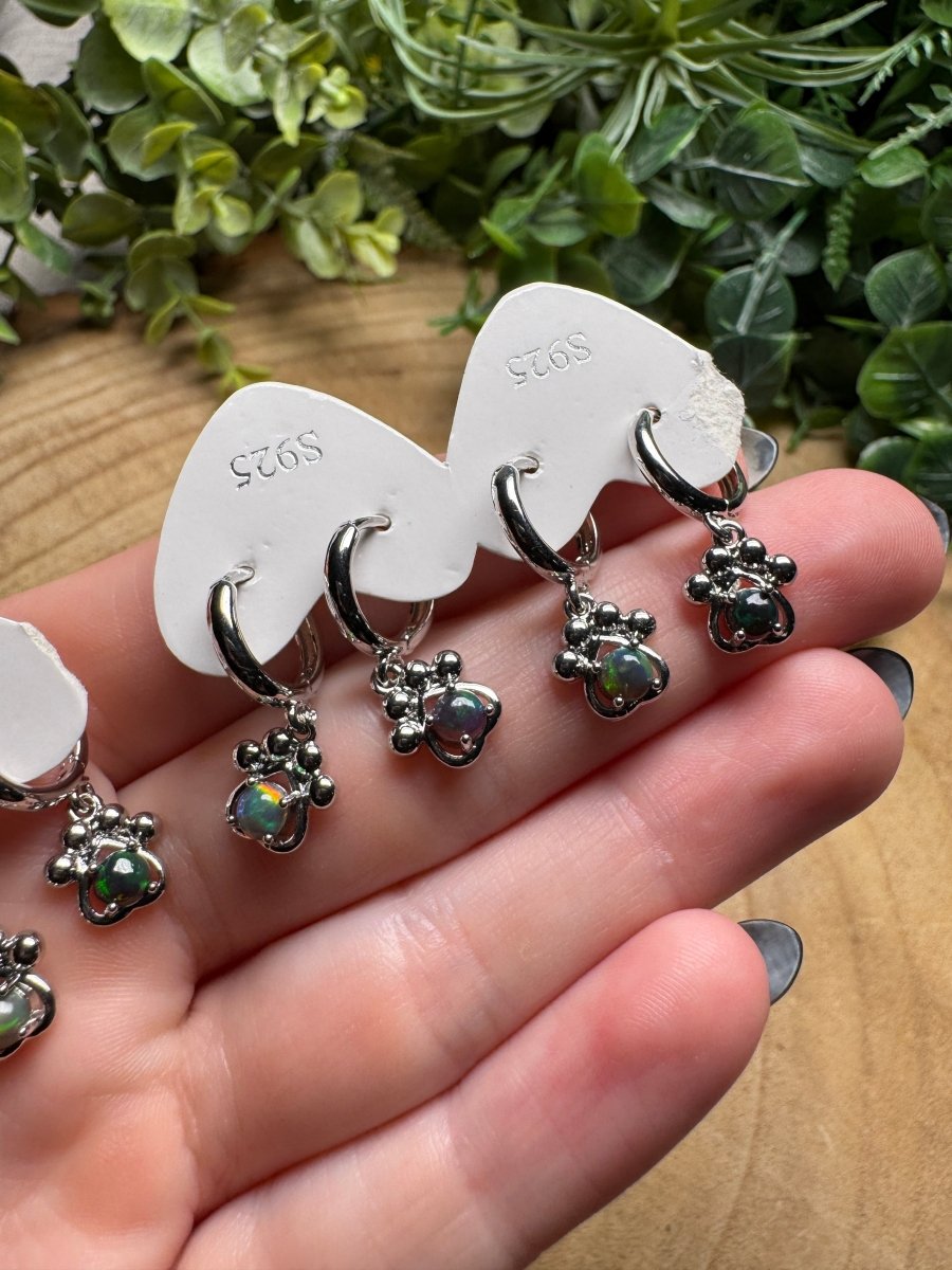 Black Opal Paw Print Huggie Earrings detail view by Copper Ashes