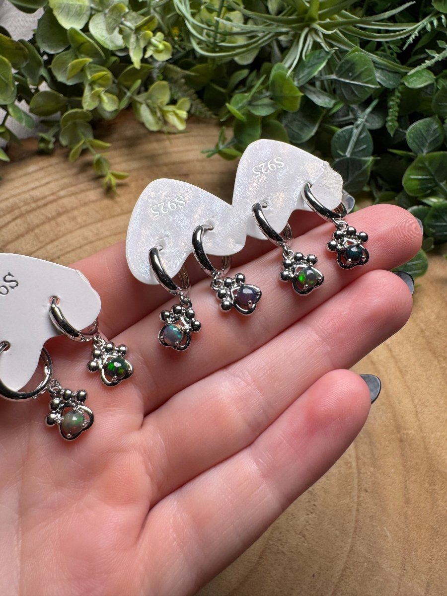 Black Opal Paw Print Huggie Earrings detail view by Copper Ashes