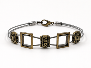 Men's brass guitar string bracelet by N Harmony Jewelry, handmade jewelry detail photo 2