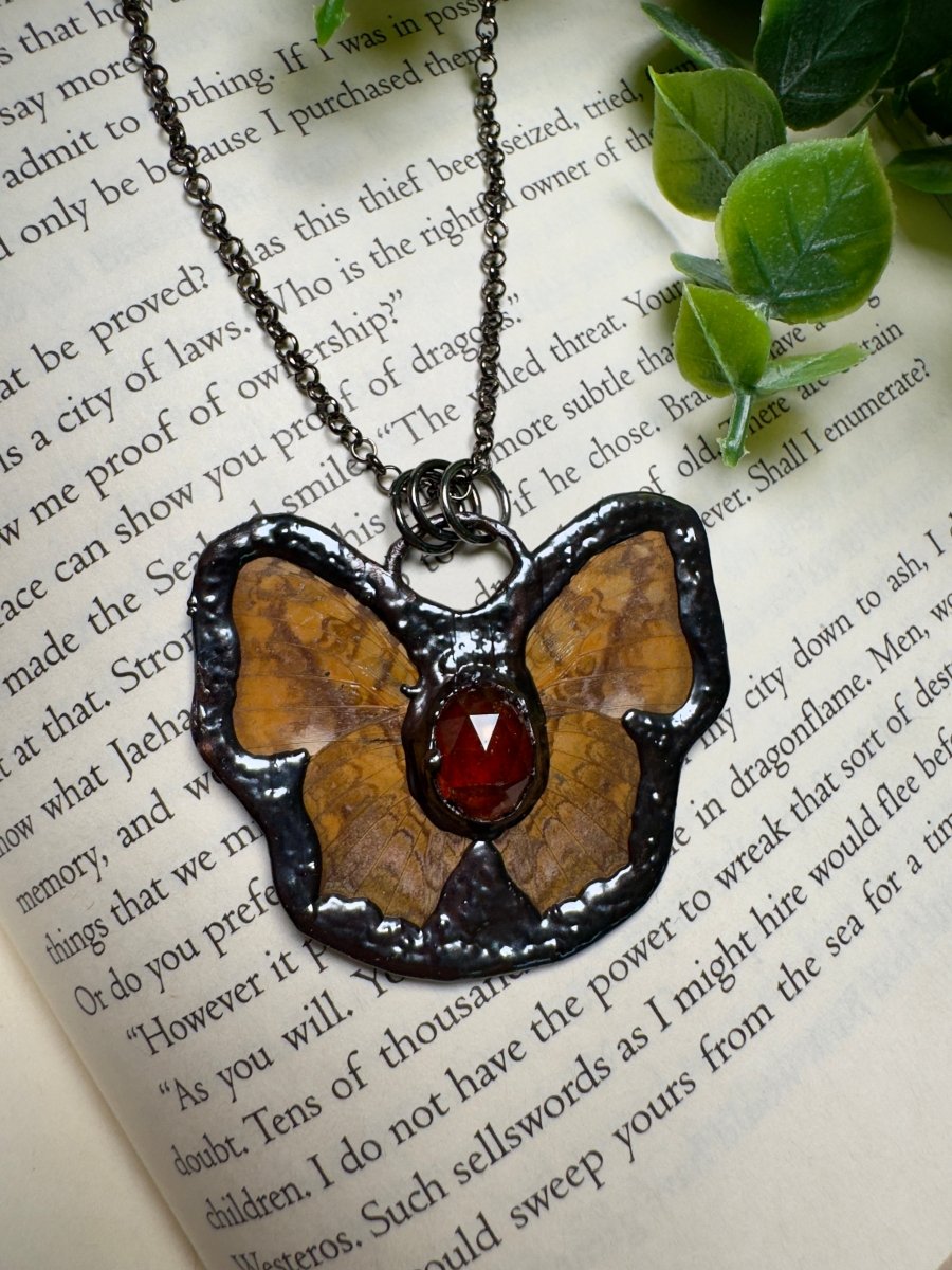 Butterfly and Orange Garnet Necklace detail view by Copper Ashes