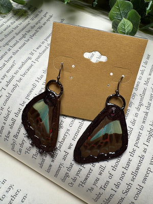 Butterfly Wing and Garnet Earrings detail view by Copper Ashes